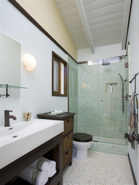 Stunning downstairs shower room with toilet.image details width: White Transitional Bathroom With a Pebble Tile Floor | HGTV
