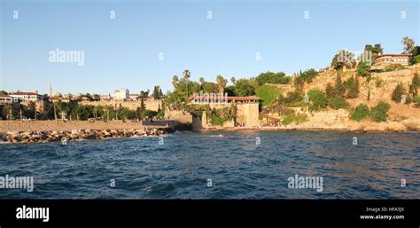 Antalya Mermerli Beach And Restaurant With The Harbour City Walls In
