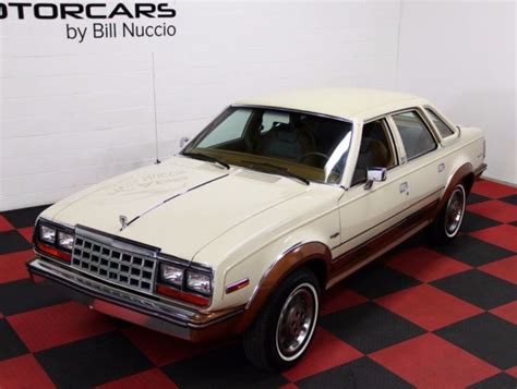Amc introduced the eagle line of sedans and wagons in 1980, based on the concord passenger car. AMC EAGLE Sedan 1984 TAN For Sale. 2ccck3550eb721149 84 ...
