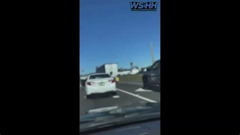 Woman Pulls Gun Out During A Traffic Accident