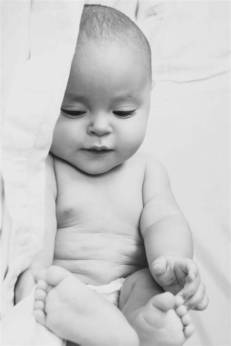 This will encourage them to crawl or stand to get their favorite toy. Baby photography + 6 month old photoshoot + baby boy ...