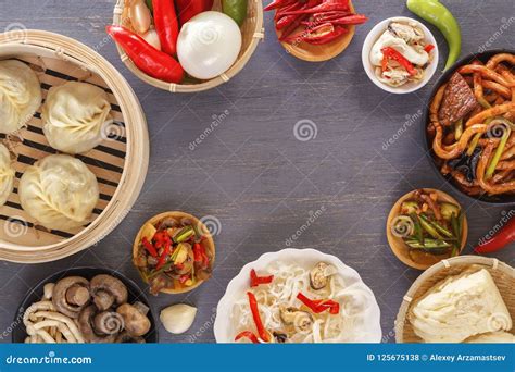 Dishes Of Chinese Cuisine In Assortment Steam Dumplings Noodles