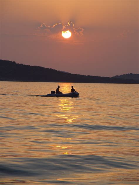 Free Images Sea Horizon Sun Sunrise Sunset Boat Sunlight