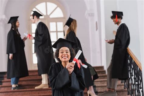 Happy African American Graduate Holding Diploma Stock Photo Image Of