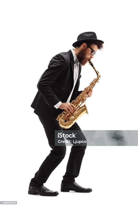 Bearded Man Playing A Saxophone Stock Photo Download Image Now