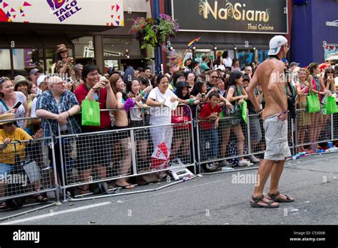 Man Flashing Crowd Women Exicted Stock Photo Alamy