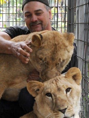 Friend of exotic-animal owner writes book about killings