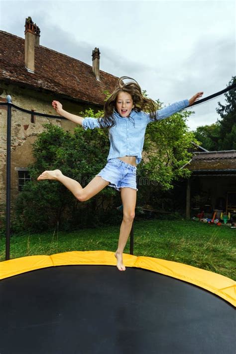 Cute Teenage Girl Jumping On Trampoline Stock Image Image Of Summer Jumping 58062967