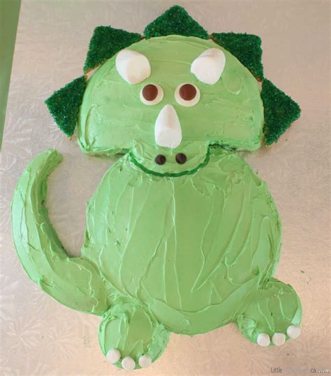 Open frosting sachets and reserve 2 tablespoons of the (white) icing for the teeth and. Dinosaur Cake Ideas: Easy Triceratops Dinosaur Birthday ...