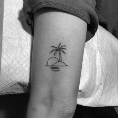 150+ tattoo ideas for beach lovers after the harsh winter we had, the beautiful days are finally here, allowing us to dream about summer vacations… we all have a fantasy of the perfect beach, with warm and golden sand, blue water with gorgeous waves to surf on and perhaps some salted wind in the coconut trees… 15 Beach-themed tattoos to get to feel like you're on holiday | Palm tattoos, Beach inspired ...
