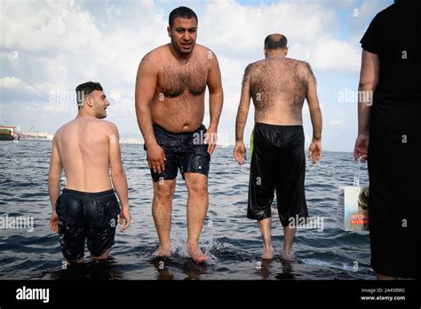 Hairy Men On The Shore Of The Sea Of Marmara Istanbul Turkey Stock