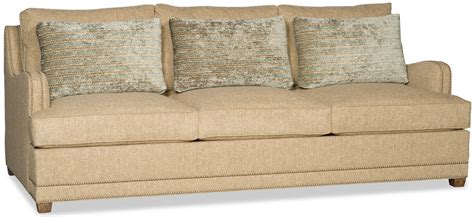 Its most basic function is to cover seams in upholstery but it's come to be used as a decorative accent on many pieces as well. Beige sofa with nailhead trim