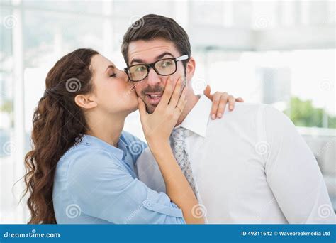 Businesswoman Kissing Her Handsome Colleague Stock Photo Image Of