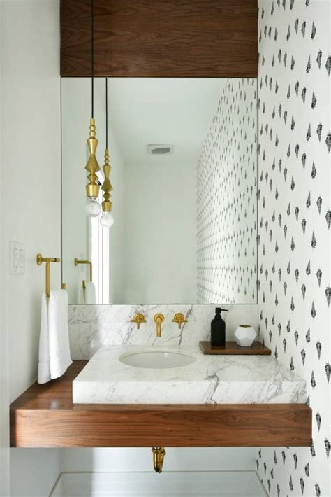 Smith and architect oscar shamamian, an eve kaplan mirror is set against glass panels by nancy lorenz; 10 Pretty Powder Rooms We Love