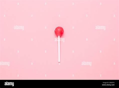 Sweet Pink Candy Lolipop On Pastel Pink Backgroundminimalist