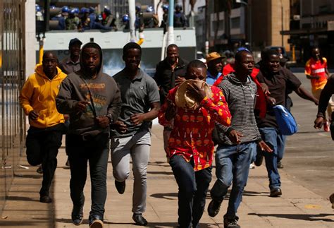 Watch Zimbabwe Police Beat Protesters As Opposition Denounces Fascist Government