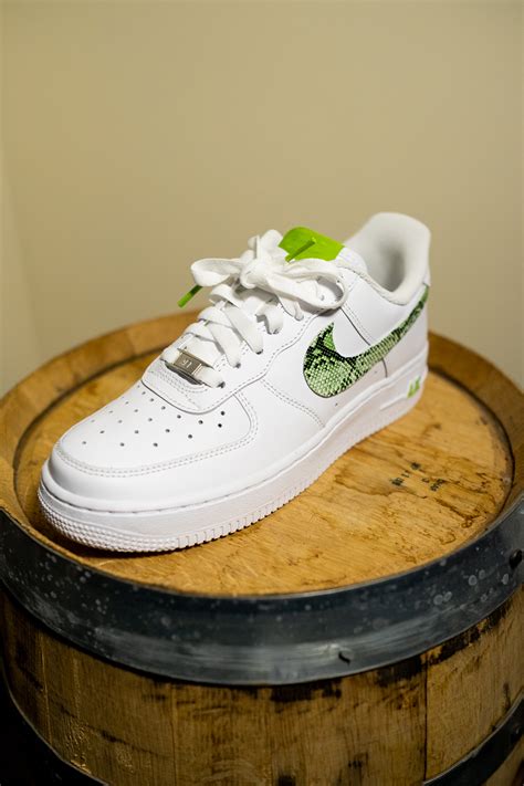 Gently rub a melamine eraser sponge over the soles to remove any remaining dirt, and then let the soles air dry before wearing. Nike Air Force 1 White Custom 'Lime Green Snakeskin' Edition
