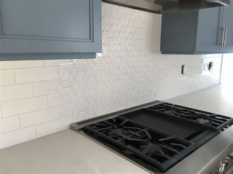 Herringbone tiles are everywhere nowadays, and this zig zag tile has made its way to bathrooms. Kitchen Backsplash with a Combination of the Diamond ...