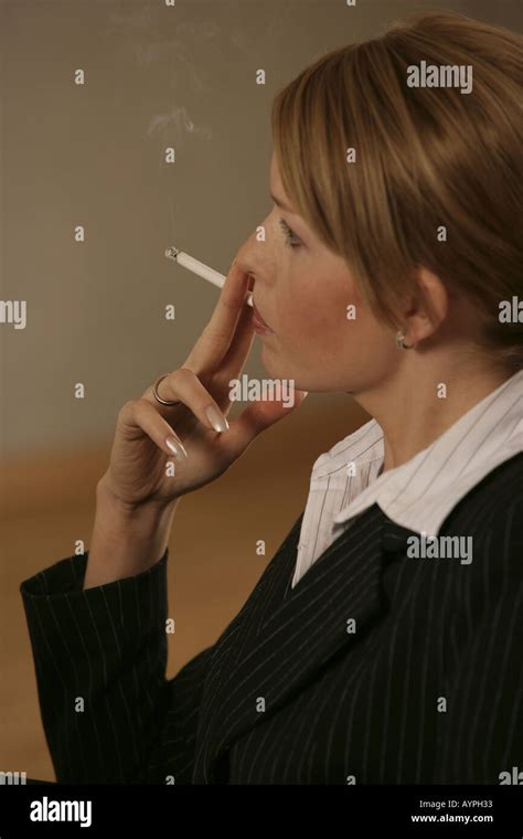 Blonde Businesswoman Smoking Hi Res Stock Photography And Images Alamy