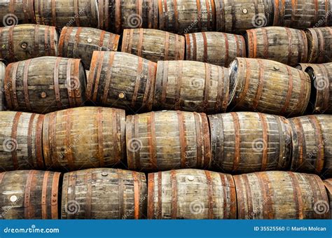 Stacked Pile Of Old Whisky And Wine Wooden Barrels Stock Photo Image