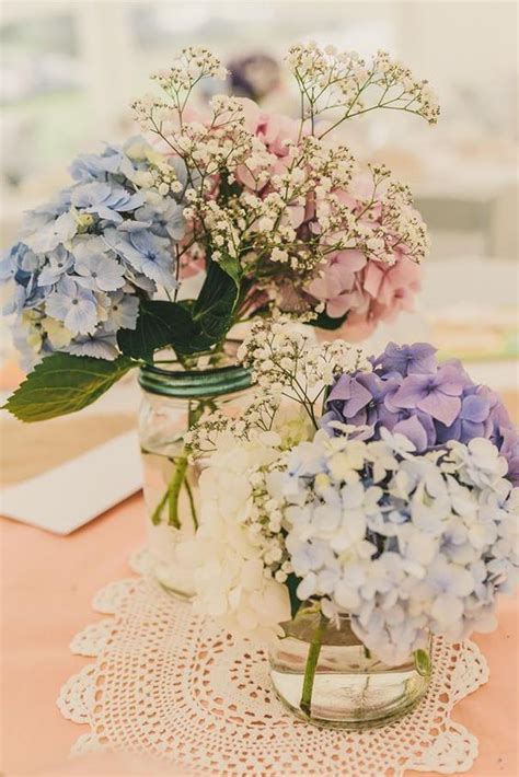 Getting married in the great outdoors practically guarantees a glorious backdrop. 21 Simple Yet Rustic DIY Hydrangea Wedding Centerpieces Ideas