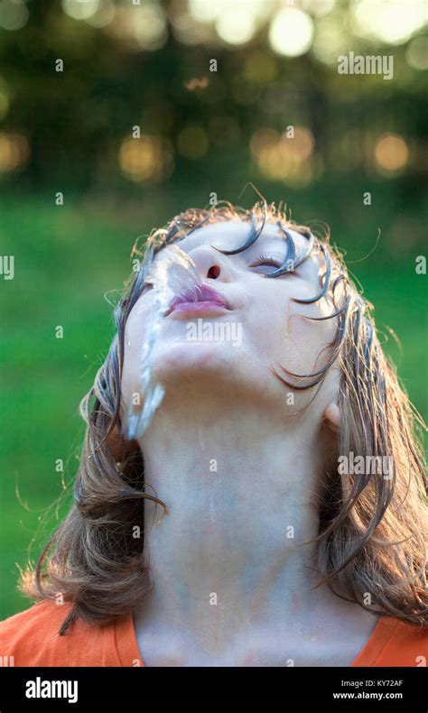 Wet Boy Fooling Around Water Squirting Stock Photo Alamy