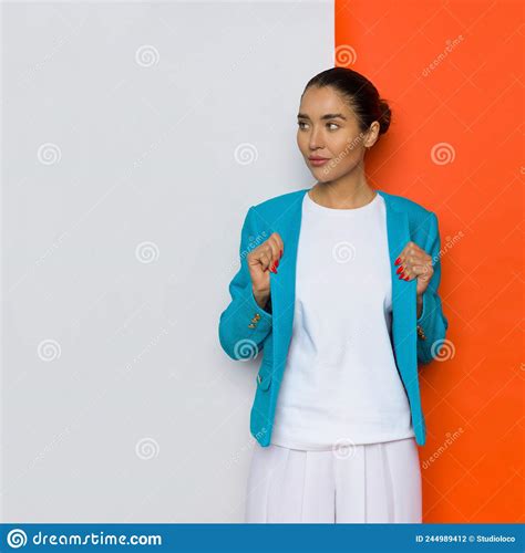 Young Woman Poses In An Unbuttoned Blue Jacket Stock Photo Image Of