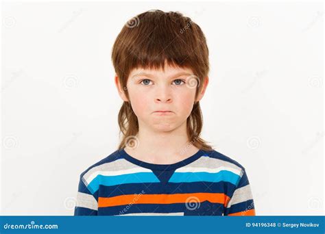 Portrait Of Angry Boy With His Lips Pursed Stock Photo Image Of
