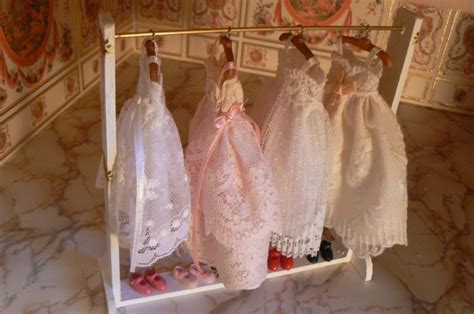 handmade miniature dress rail and bridesmaid dresses