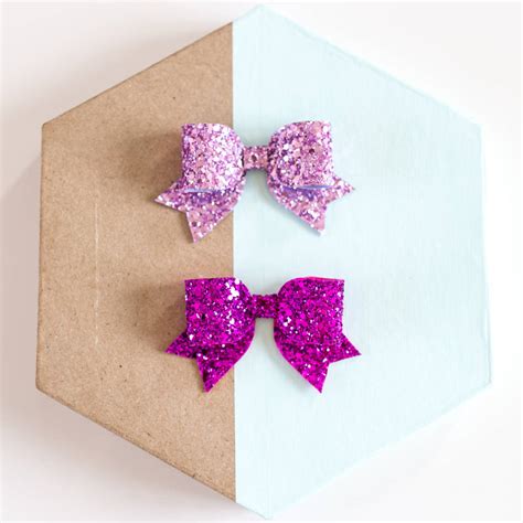 Two Medium Glitter Bows By Lovely Littles And Co