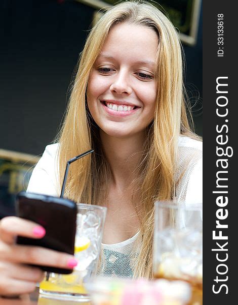 Pretty Young Girl Chatting With Smartphone Free Stock Images And Photos