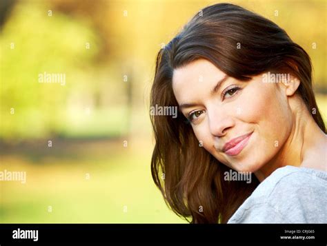 Smirking Brunette Young Woman Stock Photo Alamy