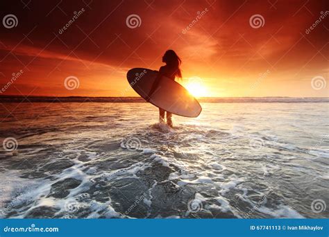Surfer Woman Going Surfing Standing With Blue Yellow Surfboard On
