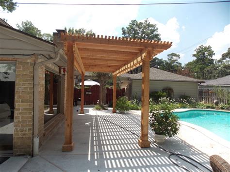 Poolside Cedar Pergola On Concrete Slab Rustic Patio Houston By Seek Design And Renovation