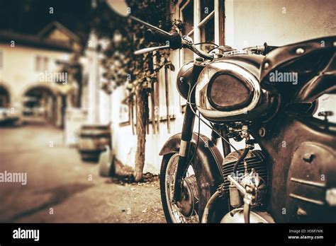 Vintage Motorcycle Closeup Parked Aged Motorcycle In The Small European Village Stock Photo Alamy