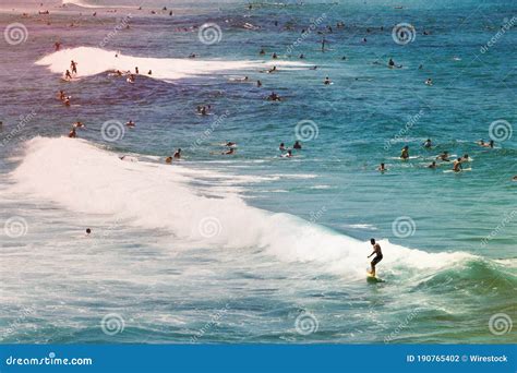 People Surfing At The Crowded Bondi Beach In Sydney Australia