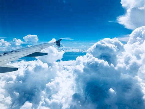 Airplane In The Sky Pictures Download Free Images On Unsplash