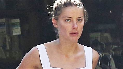 Amber Heard Has Wardrobe Malfunction In Loose Fitting Dress Photos News Com Au Australias