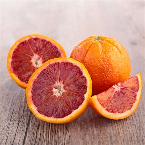 Two Yellow And Red Flower Decors Blood Orange Orange Fruit Orange