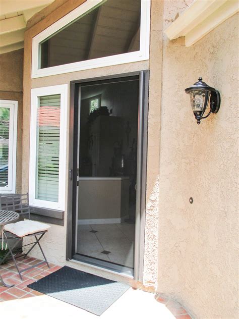 Check Out This Single Front Door Stowaway Retractable Screen Door With