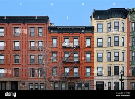 Old New York Apartment Buildings With Ornate Roof Line Cornice And