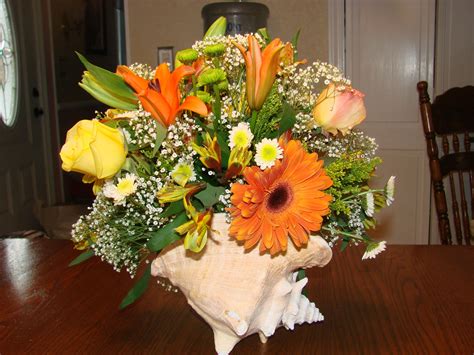 We did not find results for: Conch shell centerpiece. | Shell centerpieces, Floral ...
