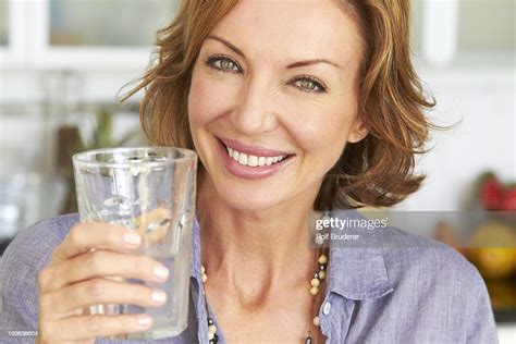 Caucasian Woman Drinking Water High Res Stock Photo Getty Images
