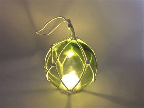 Ball floats are the perfect solution to submerge cable, pipe, or hose under water. LED Lighted Green Japanese Glass Ball Fishing Float with ...