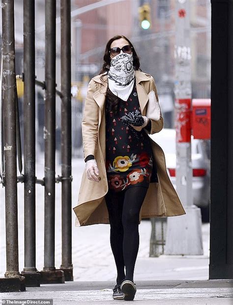 Famke Janssen Wears A Handkerchief To Cover Her Face And Gloves Amid