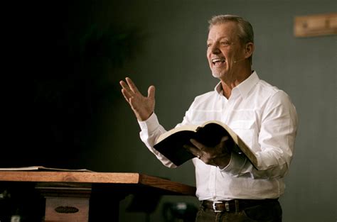 Pastor Preaching Bible