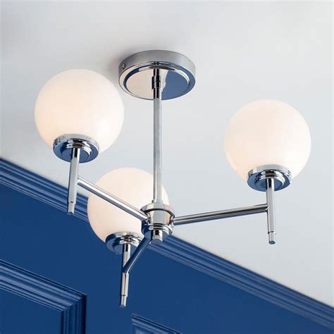 The douro bathroom semi flush globe ceiling light features a trendy, brass finish ideal for bringing a modern take on retro styling to your décor. Preston 3 Light Bathroom Ceiling Semi Flush - Chrome ...