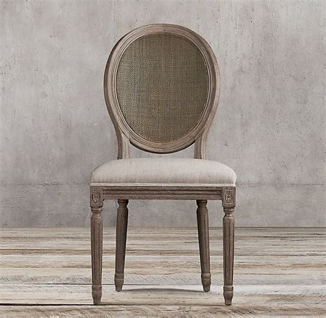 RH's Vintage French Round Cane Back Fabric Side Chair:We've reproduced