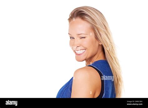 Portrait Wink And Mockup With A Woman In Studio On A White Background