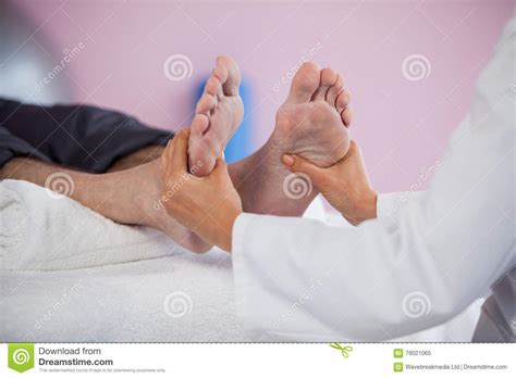 Senior Man Receiving Foot Massage From Physiotherapist Stock Image Image Of Acupressure
